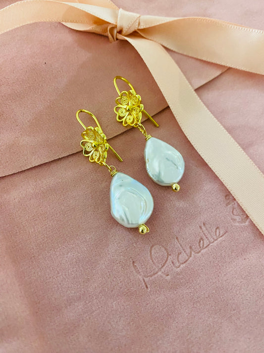 Aretes mini pollera Perlas